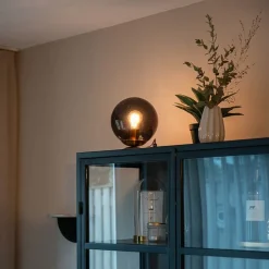 Art Deco Tischlampe Messing mit schwarzem Glas - Pallon