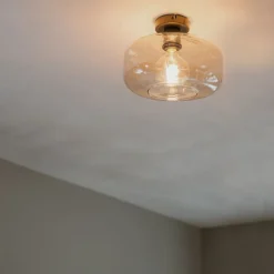 Art-Deco-Deckenleuchte schwarz mit bernsteinfarbenem Glas – Bizle