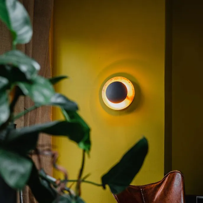 Art-Deco-Wandleuchte schwarz mit Gold - Emilienne