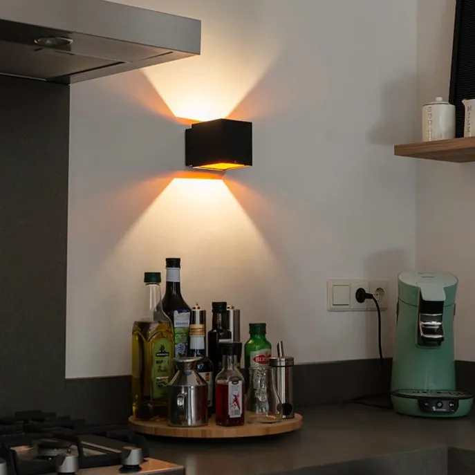 Design Wandleuchte schwarz / gold inkl. LED - Caja