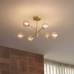 Moderne Deckenleuchte Messing mit bernsteinfarbenem Glas 6-flammig - Ryan